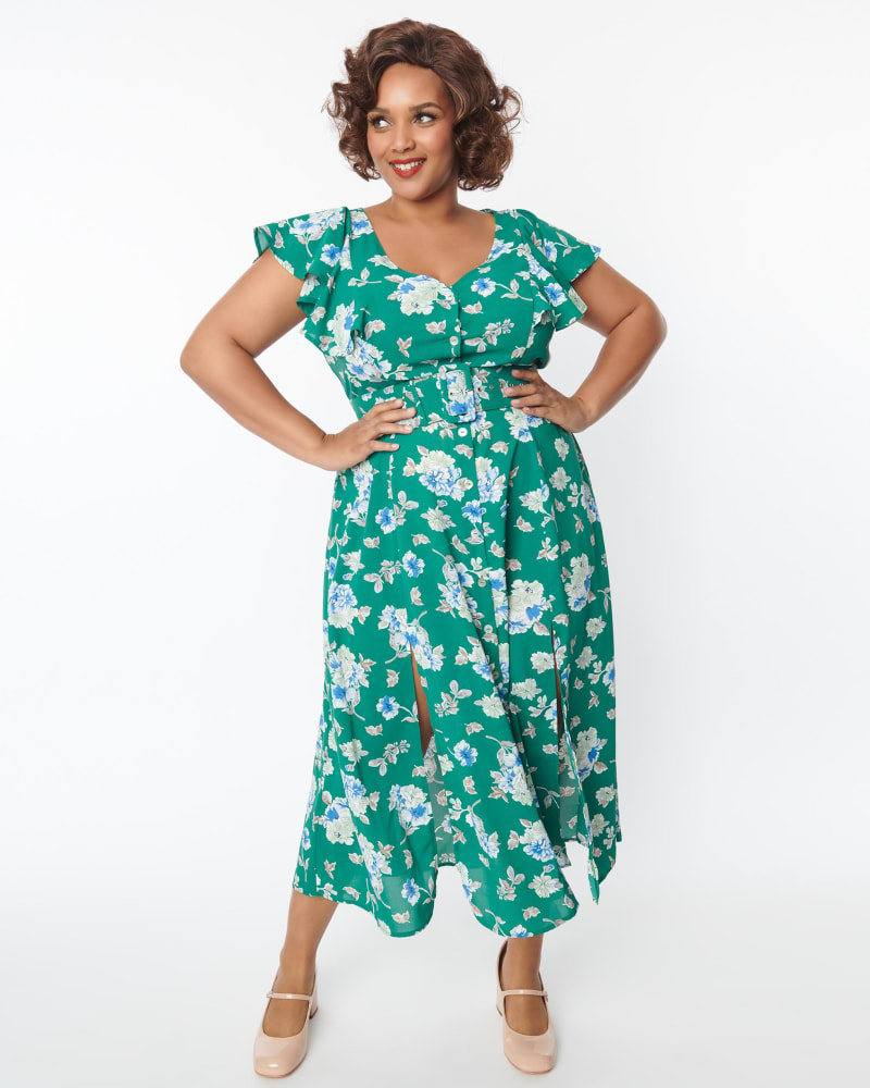 Front of a model wearing a size 1X Unique Vintage Green Floral Flutter Sleeve Midi Dress in Green, Floral by Unique Vintage. | dia_product_style_image_id:298422